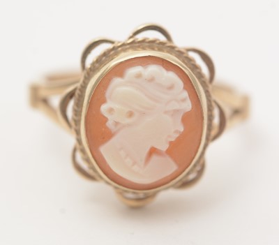 Lot 183 - A 9ct yellow gold bangle; and a cameo dress ring