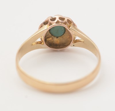Lot 135 - A Victorian turquoise and seed pearl cluster ring