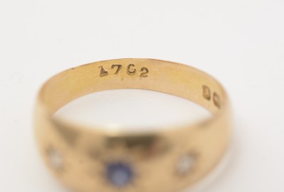 Lot 149 - A Victorian sapphire and diamond band