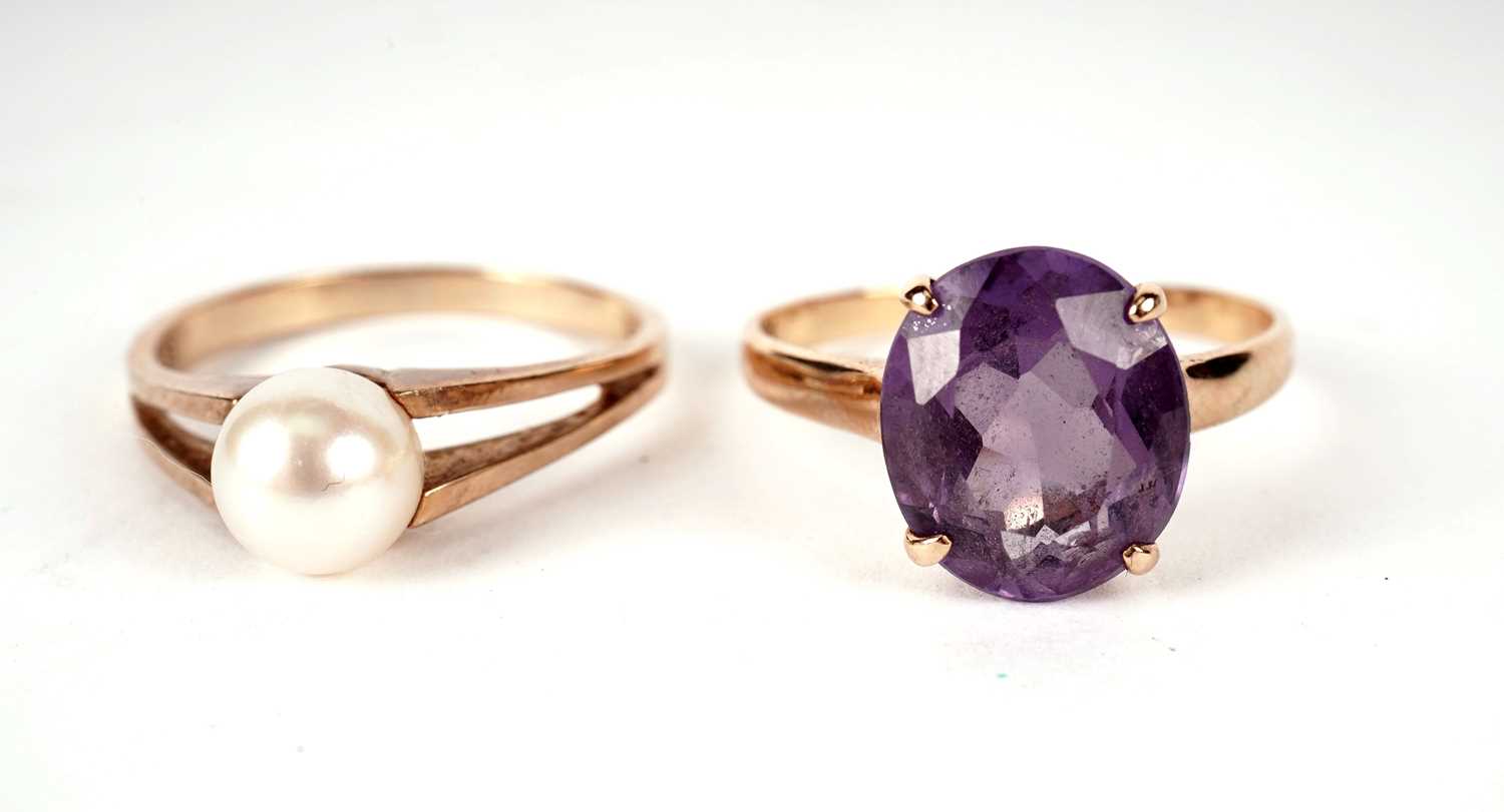 Lot 420 - A synthetic colour change sapphire dress ring; and another