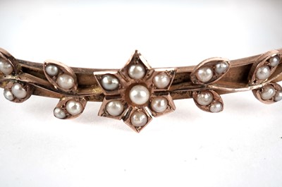 Lot 421 - A Victorian seed pearl and 9ct gold bangle