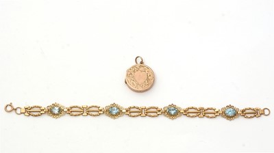 Lot 172 - An light blue topaz and 9ct yellow gold bracelet; and a locket