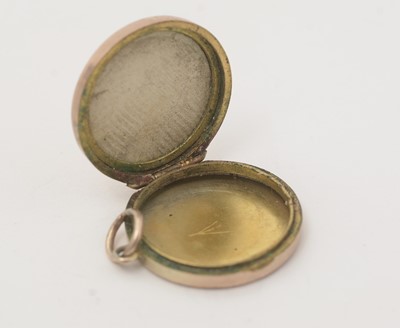 Lot 172 - An light blue topaz and 9ct yellow gold bracelet; and a locket