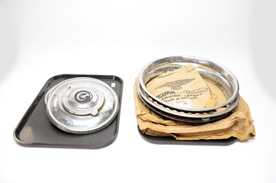 Lot 772 - Jaguar-Daimler hubcaps and metal wheel discs