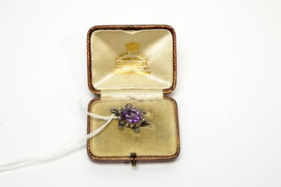 Lot 198 - An amethyst, emerald and diamond turtle pendant, retailed by Henry Tessier