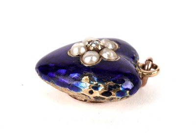 Lot 414 - A 19th Century diamond, seed pearl and enamel heart pendant