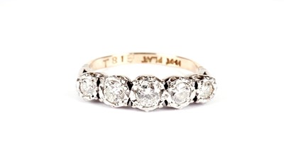 Lot 703 - A five stone diamond ring