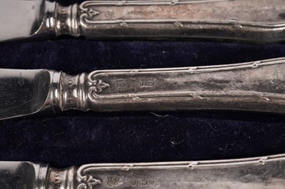 Lot 501 - A set of six tea knives and four antique silver teaspoons