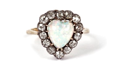 Lot 1198 - A Victorian opal and diamond heart-shaped ring