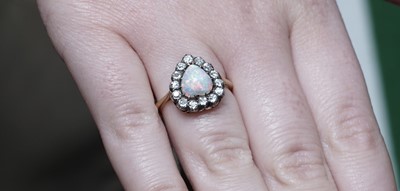 Lot 1198 - A Victorian opal and diamond heart-shaped ring