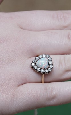 Lot 1198 - A Victorian opal and diamond heart-shaped ring