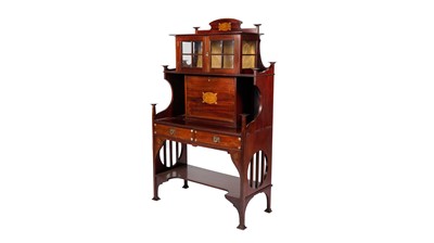 Lot 974 - An Arts and Crafts mahogany secretaire cabinet in the Liberty & Co style