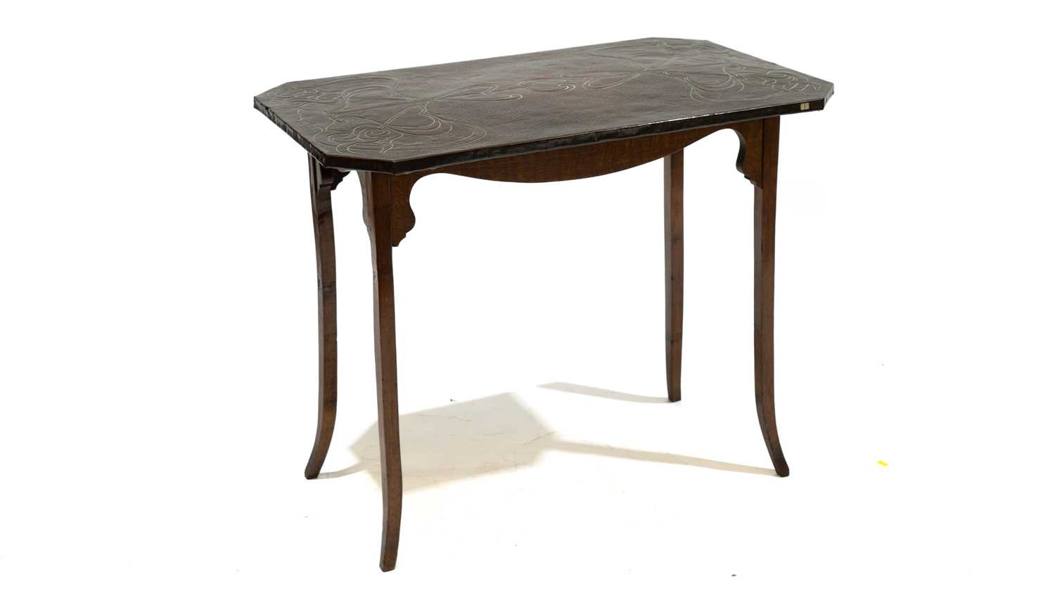 Lot 975 - An Arts & Crafts copper and oak side table, c1900