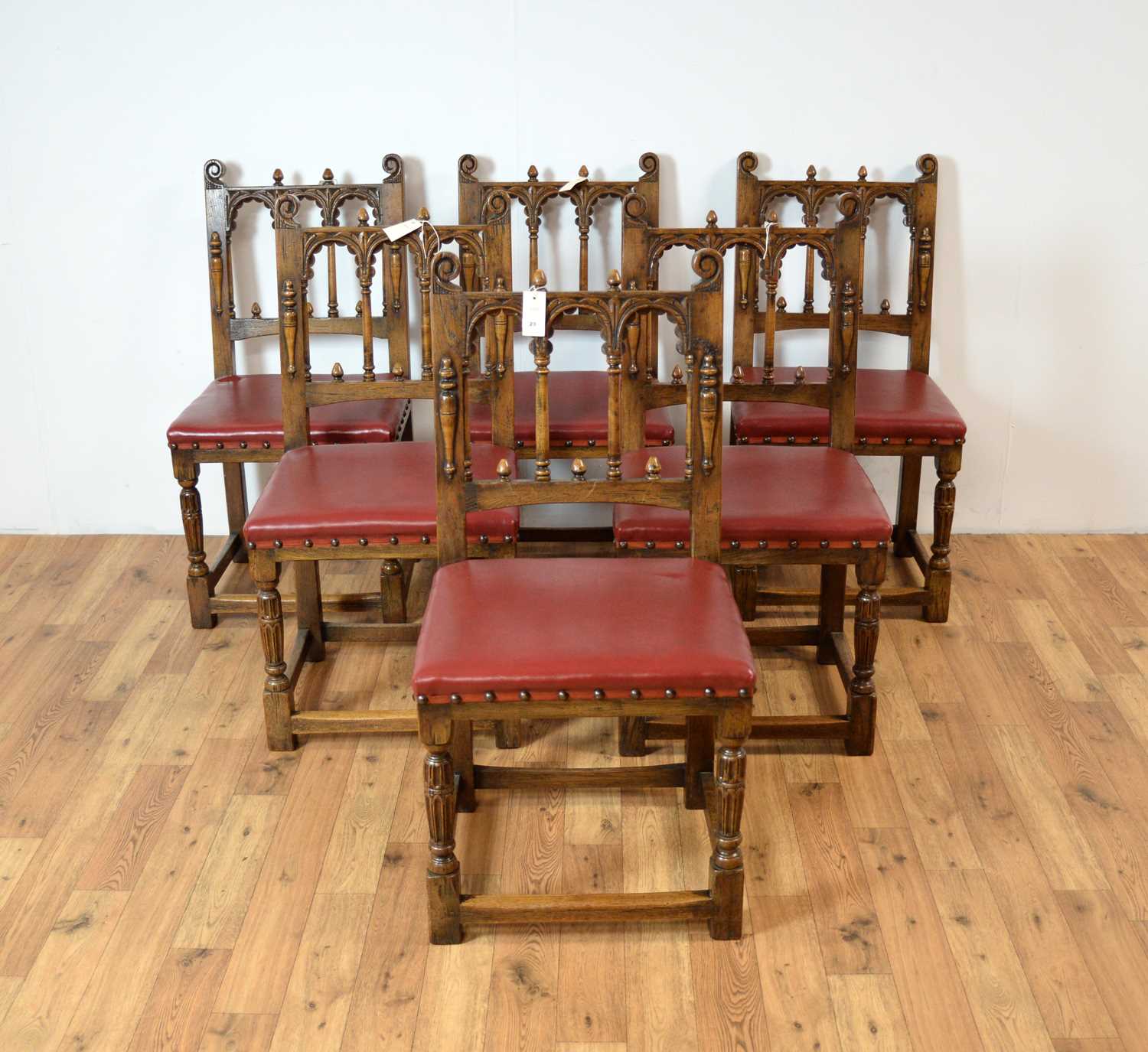 Lot 23 - A set of six 20th Century Jacobean Revival oak dining chairs