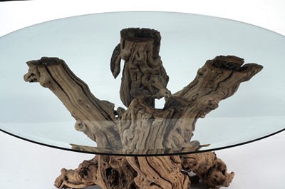 Lot 58 - A decorative modern olive wood and glass centre table