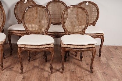 Lot 54 - A set of eight stylish modern hardwood 'faux rope' dining chairs