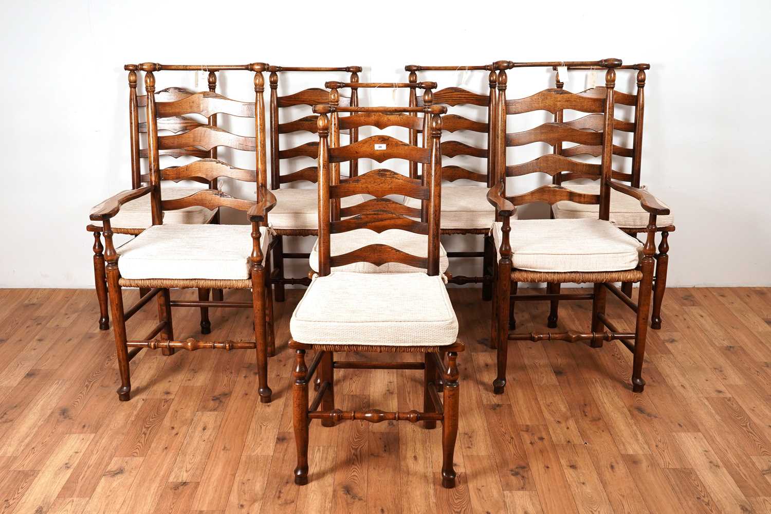 Lot 28 - A set of eight North Country style beech and elm ladderback chair