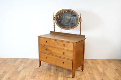 Lot 78 - A 20th century oak dressing chest