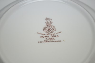 Lot 303 - A Royal Doulton ‘Royal Gold’ pattern dinner and tea service
