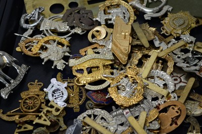 Lot 386 - A collection of military cap and other badges