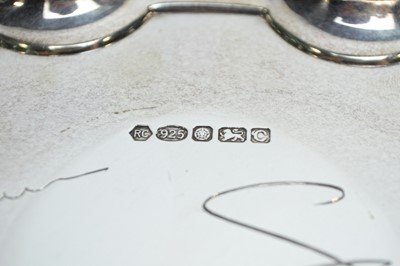 Lot 251 - A silver presentation salver; and a decanter label