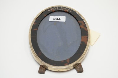 Lot 244 - An early 20th Century silver and tortoiseshell photograph frame