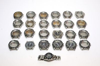 Lot 215 - A collection of Military CWC watch parts