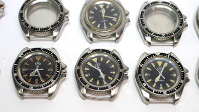 Lot 215 - A collection of Military CWC watch parts