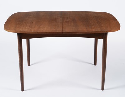Lot 62 - E Gomme for G Plan: A retro teak extending dining table and four chairs