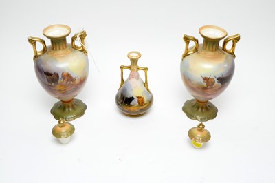 Lot 162 - A pair of Crown Devon Fieldings twin handled urn vases and covers