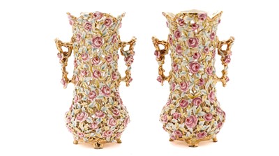 Lot 836 - A pair of Zolnay reticulated floral vases