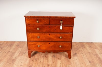 Lot 6 - A Georgian line inlaid mahogany chest of drawers