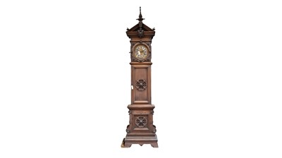 Lot 858 - An early 20th Century German walnut longcase clock