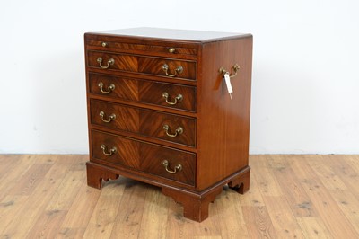 Lot 56 - A reproduction mahogany chest of drawers of diminutive size