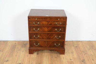 Lot 56 - A reproduction mahogany chest of drawers of diminutive size
