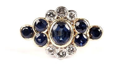 Lot 1202 - A sapphire and diamond ring