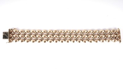 Lot 1204 - A 9ct yellow gold cuff bracelet