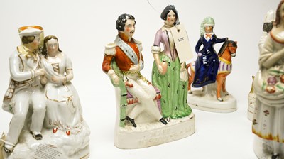 Lot 93 - A selection of Staffordshire ceramic flatback figures