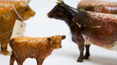 Lot 108 - A collection of Beswick ceramic figures of cows