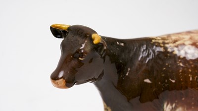 Lot 108 - A collection of Beswick ceramic figures of cows
