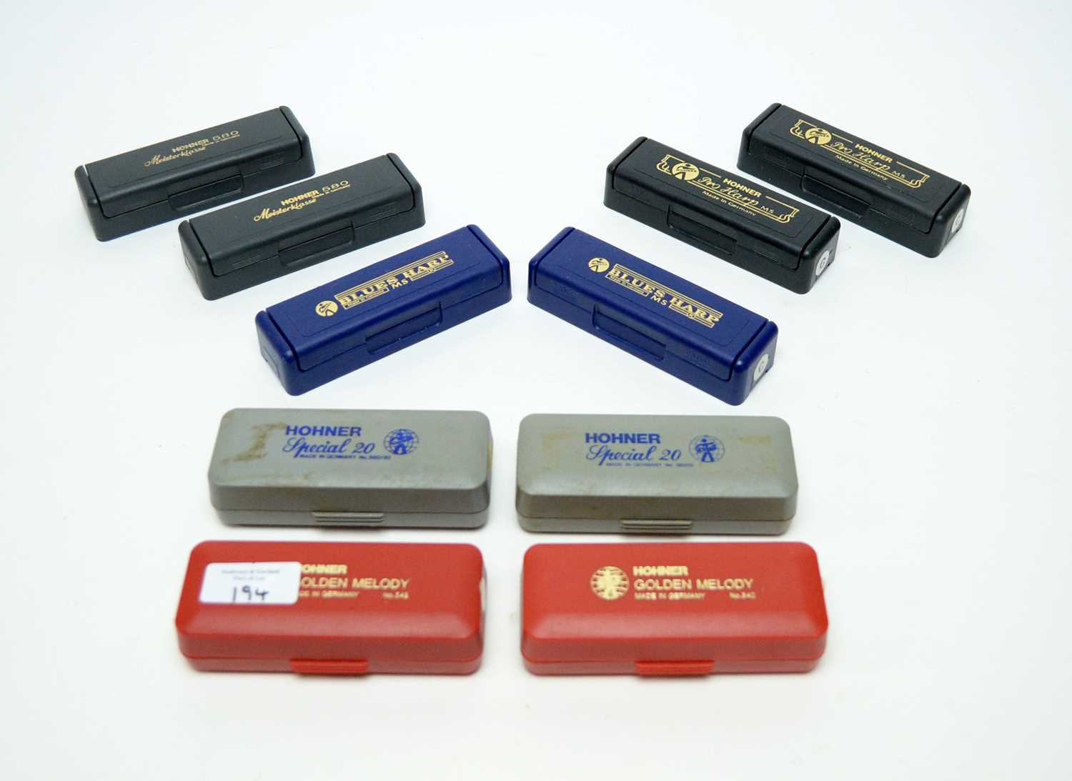 Lot 194 - A collection of harmonicas