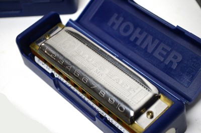 Lot 194 - A collection of harmonicas