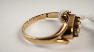 Lot 484 - A gold ring and a silver ring
