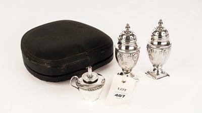 Lot 407 - A pair of silver pepper pots and a table lighter