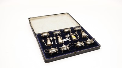 Lot 416 - An extensive silver condiment set, by Reid & Sons