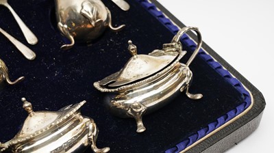 Lot 416 - An extensive silver condiment set, by Reid & Sons