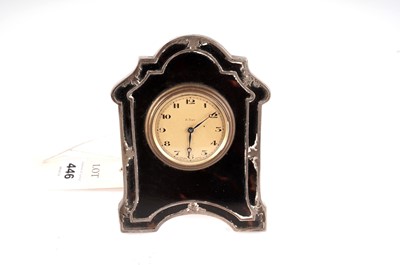 Lot 446 - A 1920s silver and tortoiseshell desk clock