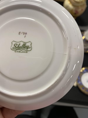 Lot 152 - Five Shelley coffee cans and saucers with silver handles