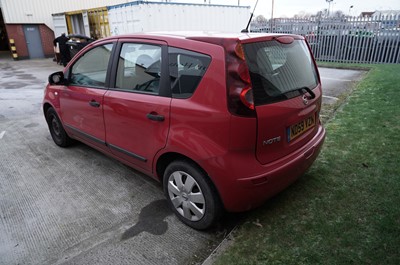 Lot 329 - A Nissan Note Visia red petrol car