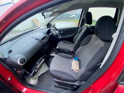 Lot 329 - A Nissan Note Visia red petrol car